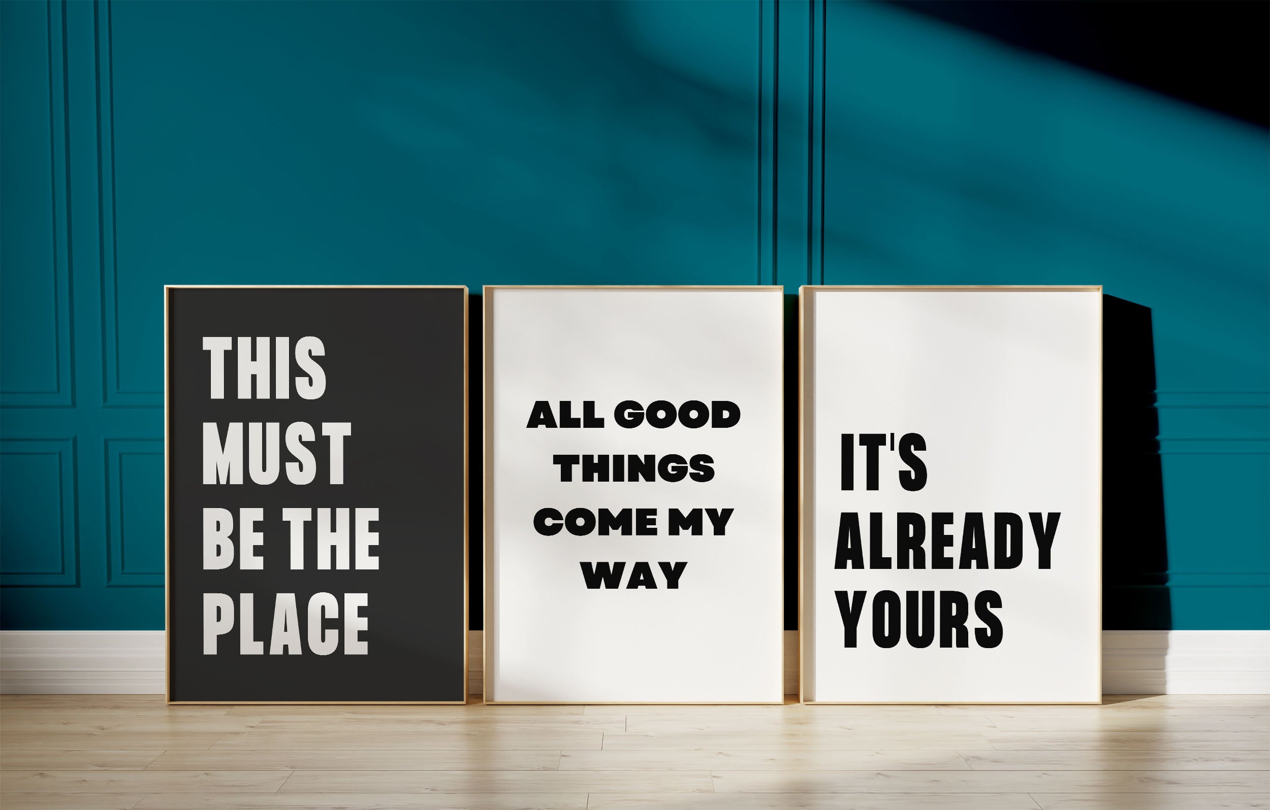 breakfastcasual printables site banner with 3 prints, this must be the place, all good things come my way, it's already yours all in black and white with a teal wall background